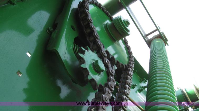 image for item G2296 2013 John Deere 569 round baler