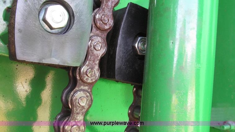 image for item G2296 2013 John Deere 569 round baler