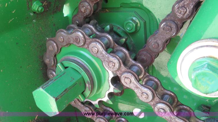 image for item G2296 2013 John Deere 569 round baler