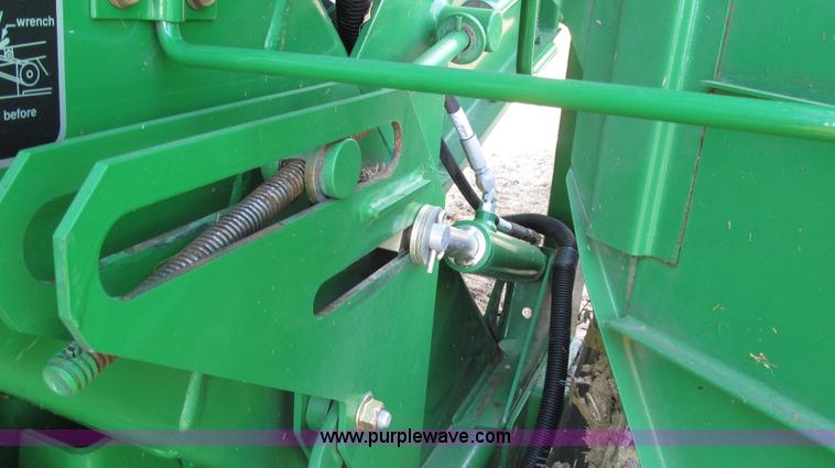 image for item G2296 2013 John Deere 569 round baler