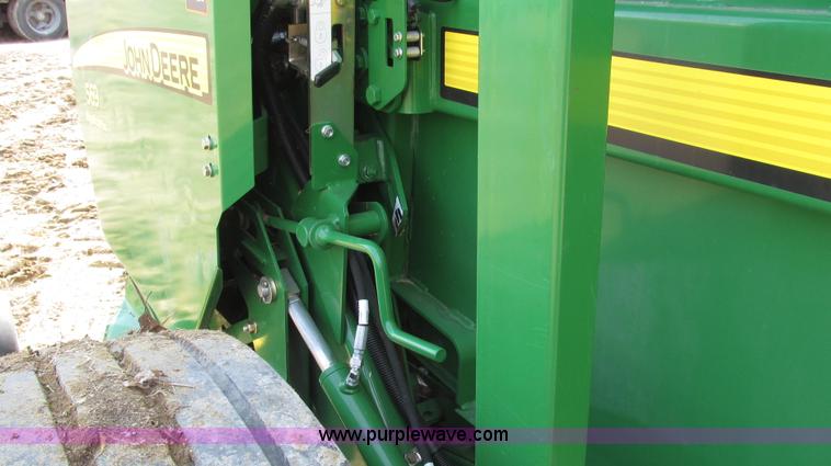 image for item G2296 2013 John Deere 569 round baler