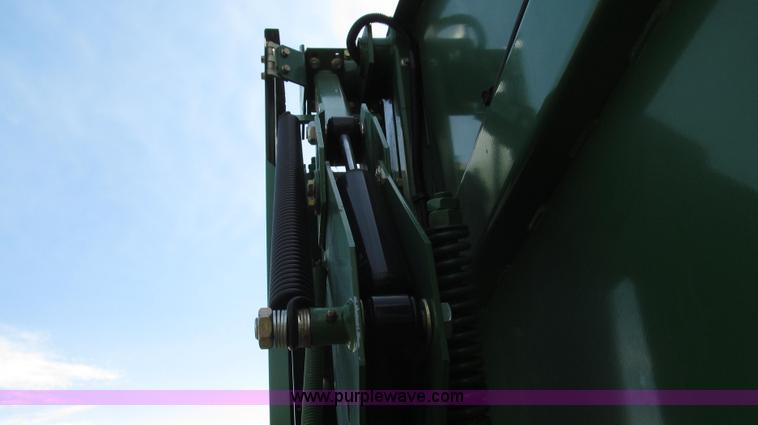 image for item G2296 2013 John Deere 569 round baler