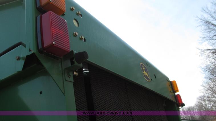 image for item G2296 2013 John Deere 569 round baler