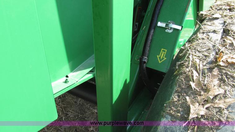 image for item G2296 2013 John Deere 569 round baler