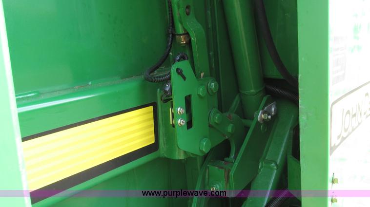 image for item G2296 2013 John Deere 569 round baler