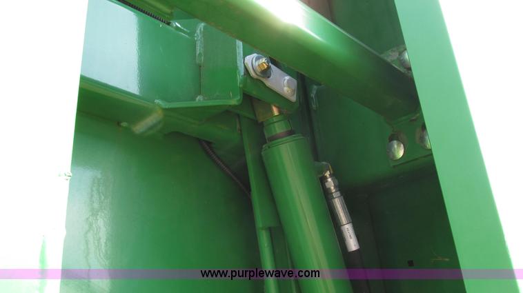 image for item G2296 2013 John Deere 569 round baler