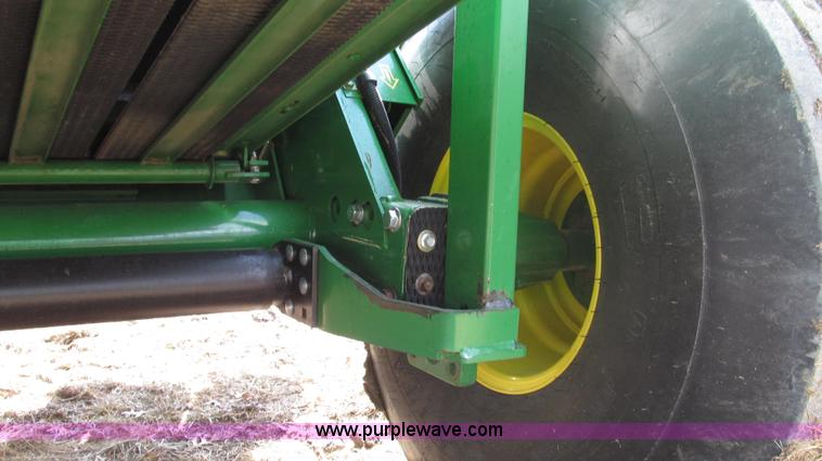image for item G2296 2013 John Deere 569 round baler