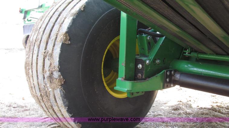 image for item G2296 2013 John Deere 569 round baler