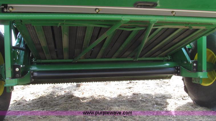 image for item G2296 2013 John Deere 569 round baler
