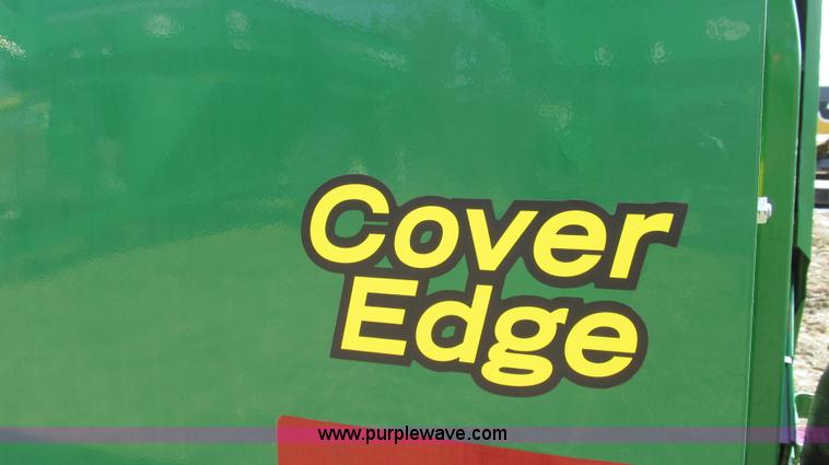 image for item G2296 2013 John Deere 569 round baler