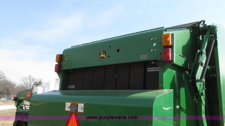image for item G2296 2013 John Deere 569 round baler