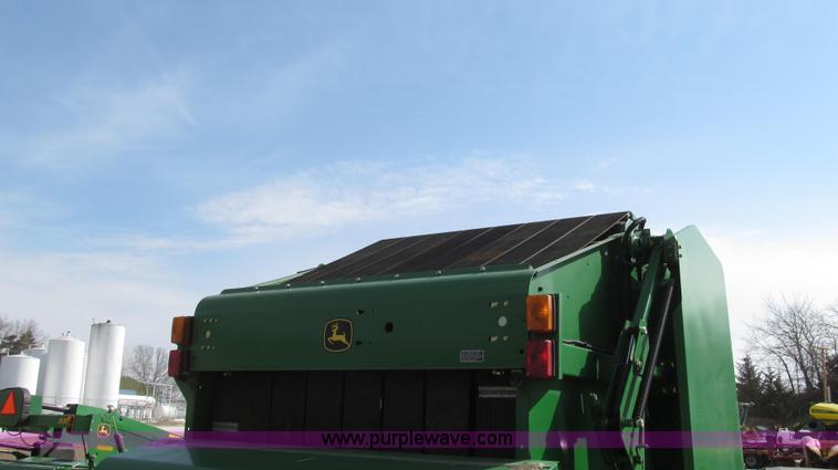 image for item G2296 2013 John Deere 569 round baler
