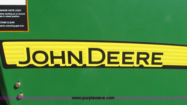 image for item G2296 2013 John Deere 569 round baler