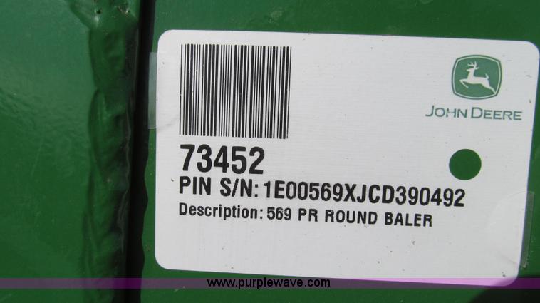 image for item G2296 2013 John Deere 569 round baler