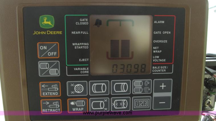 image for item G2296 2013 John Deere 569 round baler