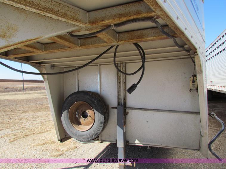 image for item I7499 2004 Southern Classic aluminum triple axle livestock trailer