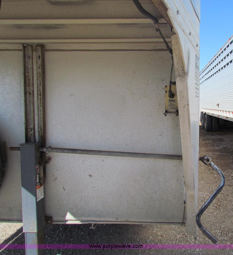 image for item I7499 2004 Southern Classic aluminum triple axle livestock trailer