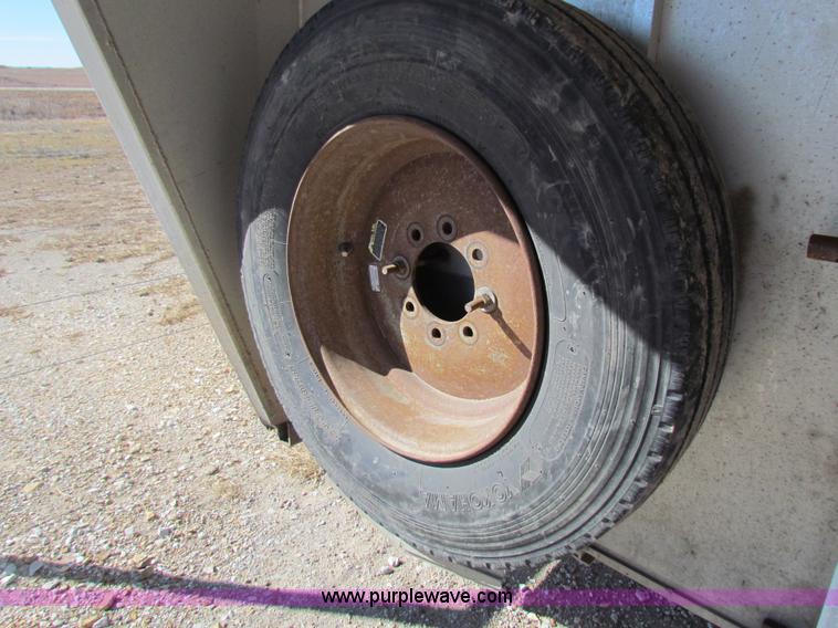 image for item I7499 2004 Southern Classic aluminum triple axle livestock trailer