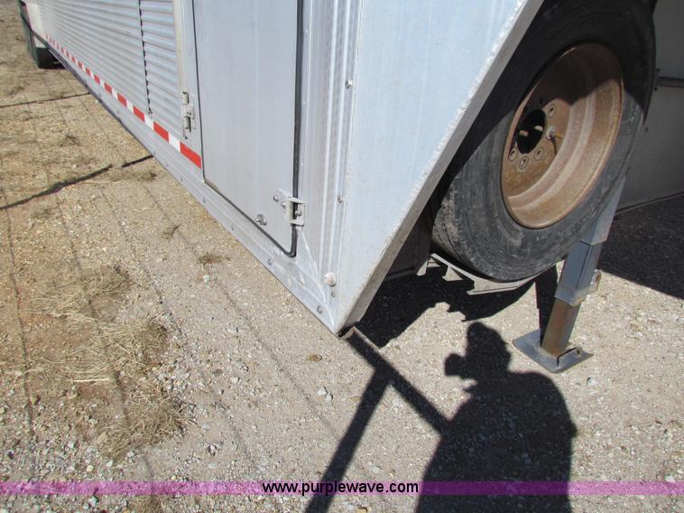 image for item I7499 2004 Southern Classic aluminum triple axle livestock trailer