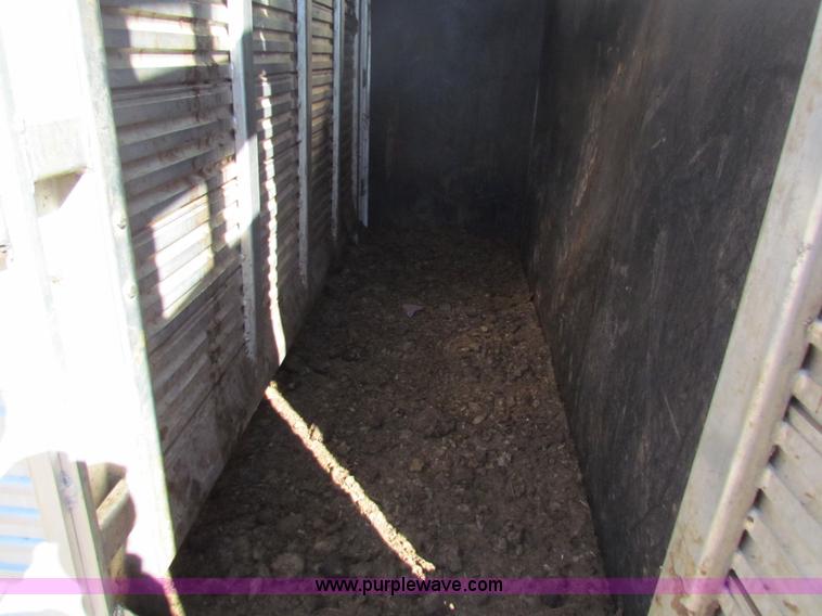 image for item I7499 2004 Southern Classic aluminum triple axle livestock trailer