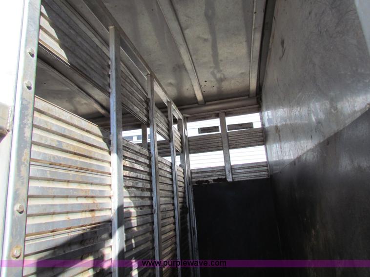 image for item I7499 2004 Southern Classic aluminum triple axle livestock trailer