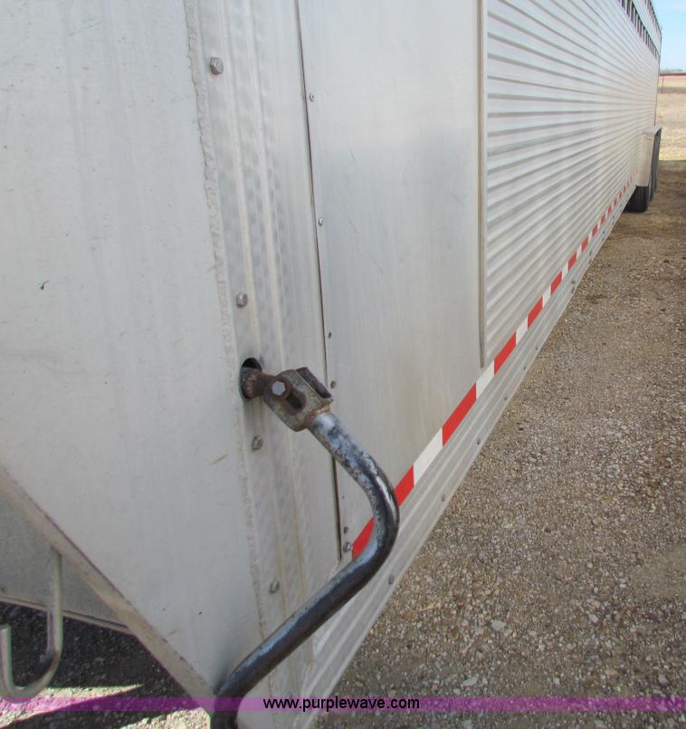 image for item I7499 2004 Southern Classic aluminum triple axle livestock trailer