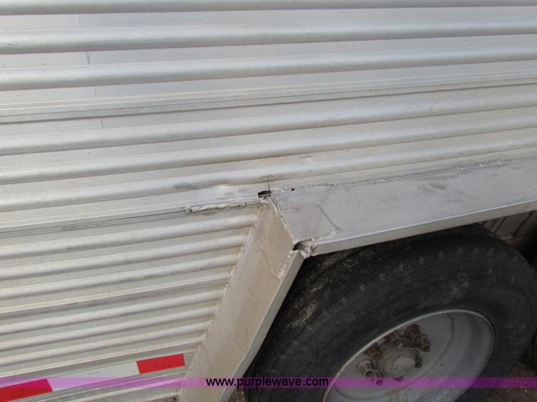 image for item I7499 2004 Southern Classic aluminum triple axle livestock trailer