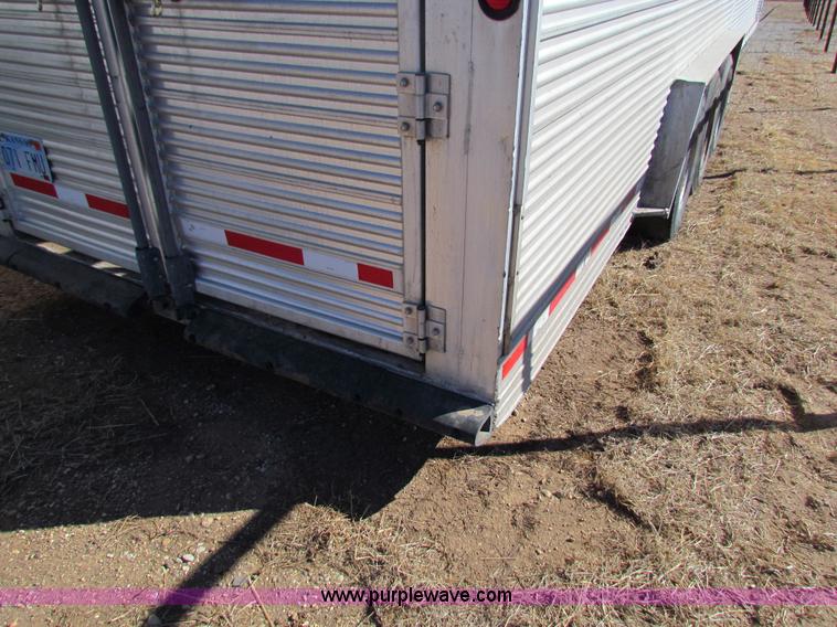 image for item I7499 2004 Southern Classic aluminum triple axle livestock trailer