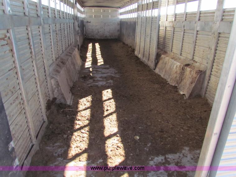 image for item I7499 2004 Southern Classic aluminum triple axle livestock trailer