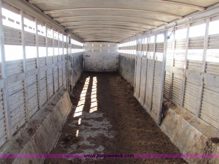 image for item I7499 2004 Southern Classic aluminum triple axle livestock trailer