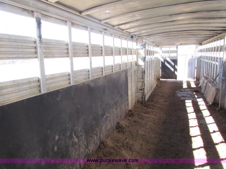 image for item I7499 2004 Southern Classic aluminum triple axle livestock trailer