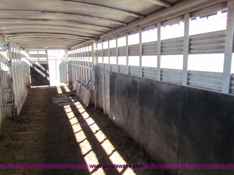 image for item I7499 2004 Southern Classic aluminum triple axle livestock trailer