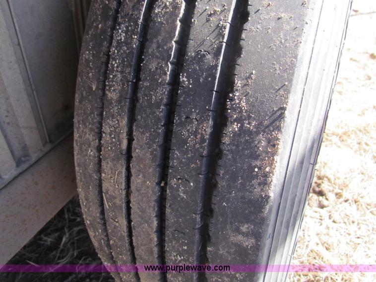 image for item I7499 2004 Southern Classic aluminum triple axle livestock trailer