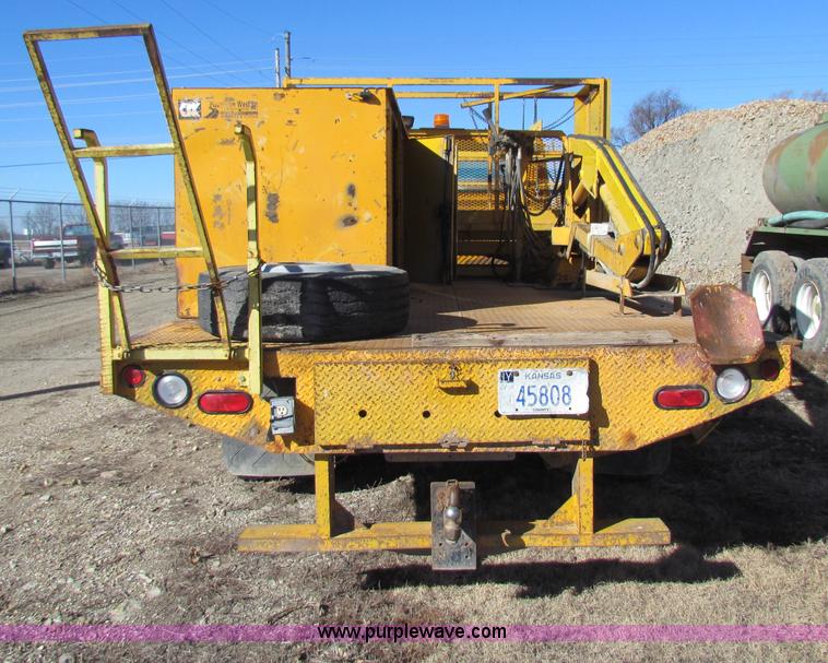 image for item C1863 2000 International 4700 Lo-Profile sign truck