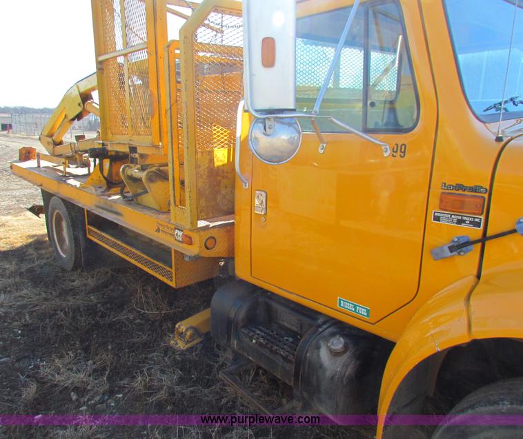 image for item C1863 2000 International 4700 Lo-Profile sign truck