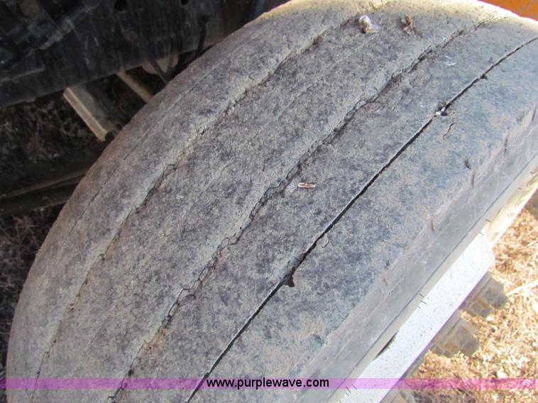 image for item C1863 2000 International 4700 Lo-Profile sign truck