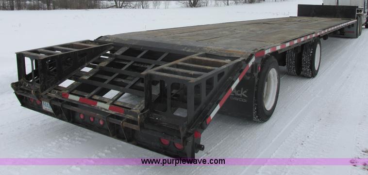 image for item E5283 1986 Trail King TS7DCS-482 spread axle drop deck equipment trailer