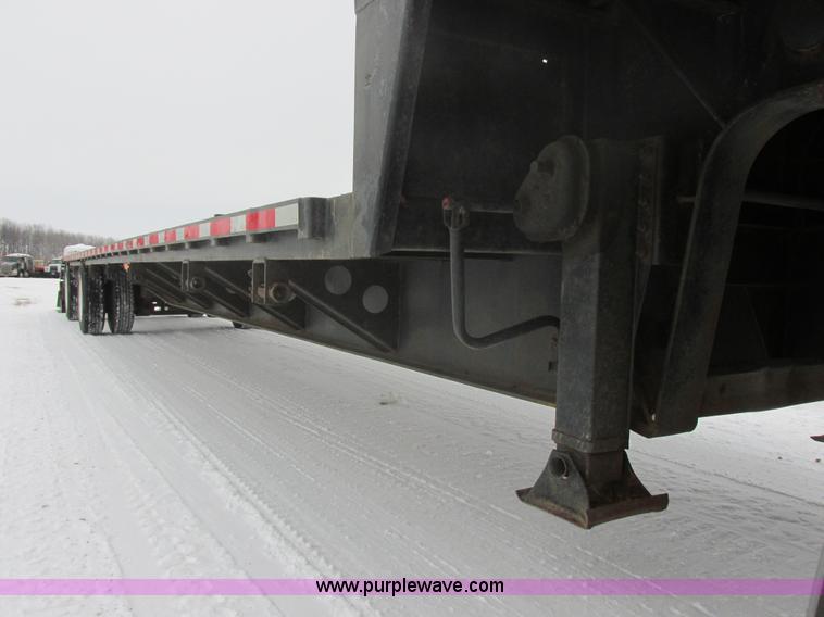 image for item E5283 1986 Trail King TS7DCS-482 spread axle drop deck equipment trailer