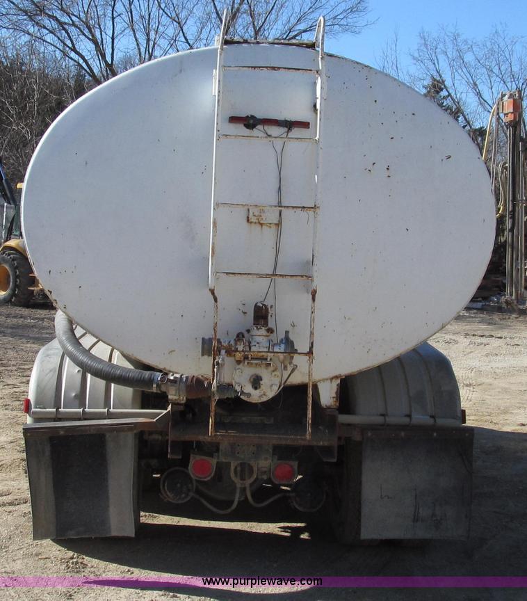 image for item G2287 1985 Volvo White WCS water truck