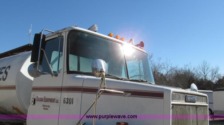 image for item G2287 1985 Volvo White WCS water truck