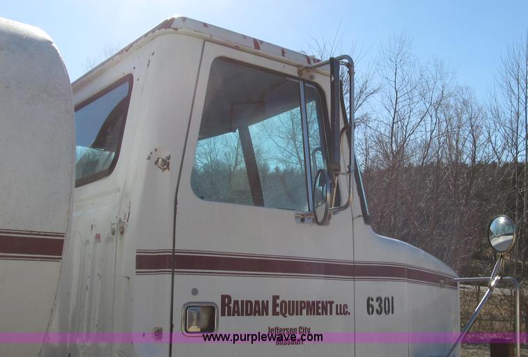 image for item G2287 1985 Volvo White WCS water truck
