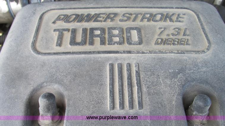 image for item G9159 1999 Ford F550 flatbed truck