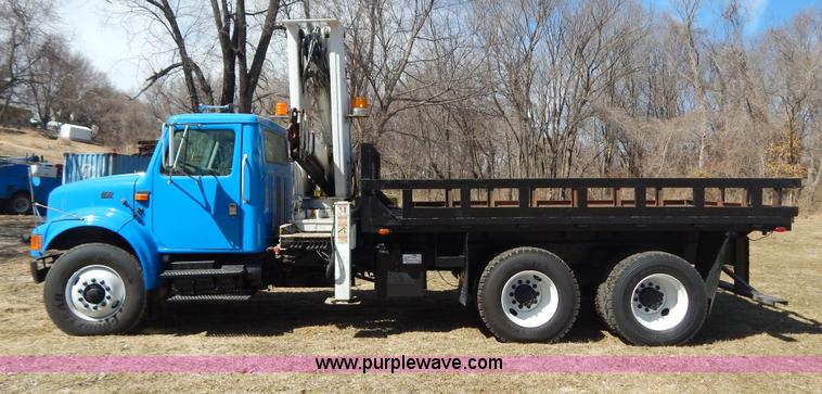 image for item I1134 1996 International 4900 flatbed truck with crane