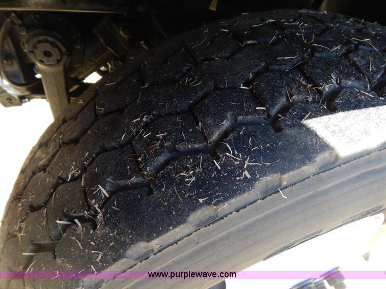 image for item I1134 1996 International 4900 flatbed truck with crane