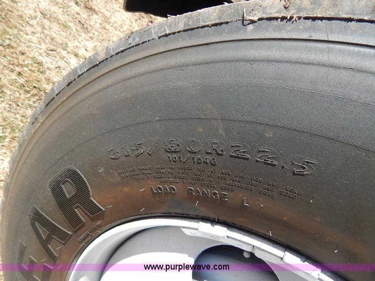 image for item I1134 1996 International 4900 flatbed truck with crane