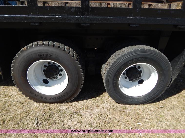 image for item I1134 1996 International 4900 flatbed truck with crane