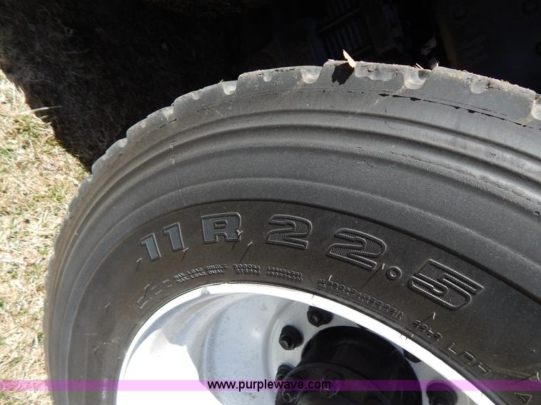 image for item I1134 1996 International 4900 flatbed truck with crane