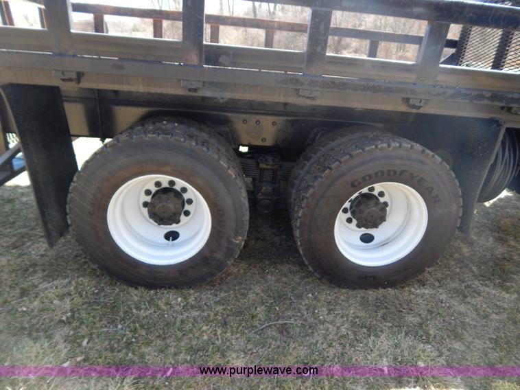 image for item I1134 1996 International 4900 flatbed truck with crane