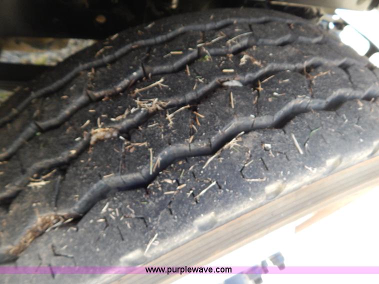 image for item I1134 1996 International 4900 flatbed truck with crane