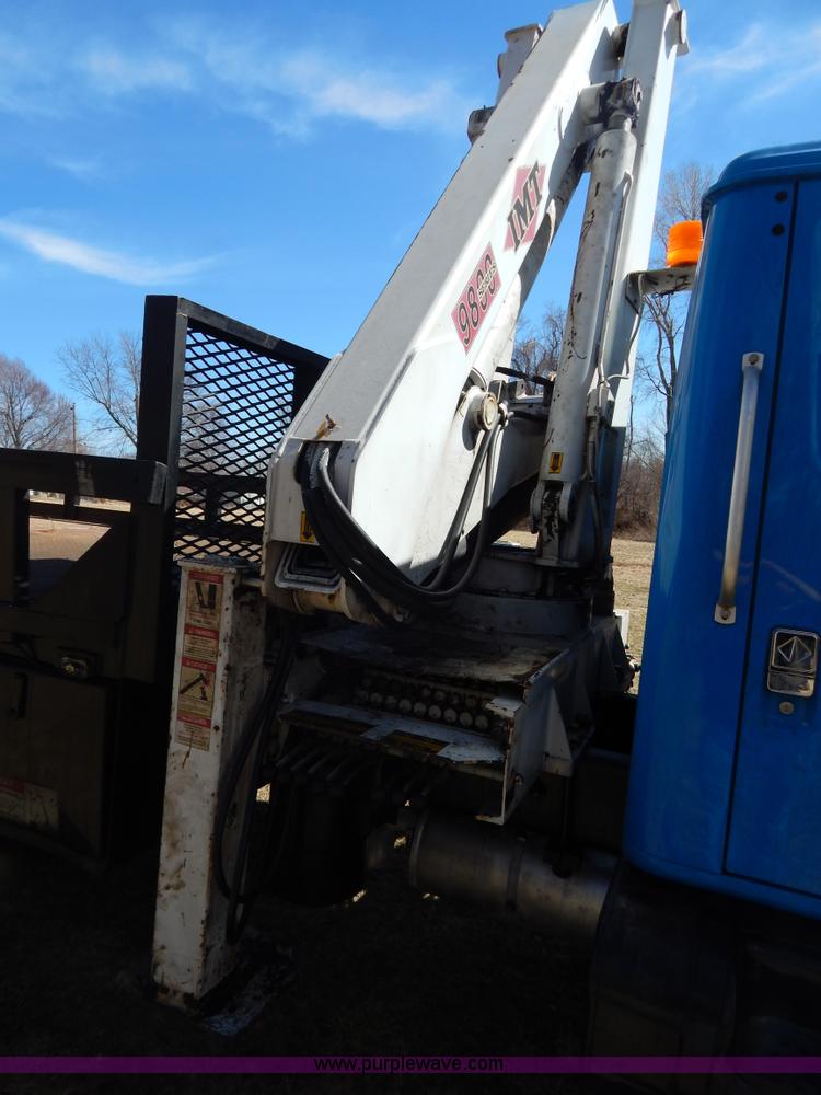 image for item I1134 1996 International 4900 flatbed truck with crane